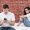 man-checking-his-phone-while-his-girlfriend-is-angry